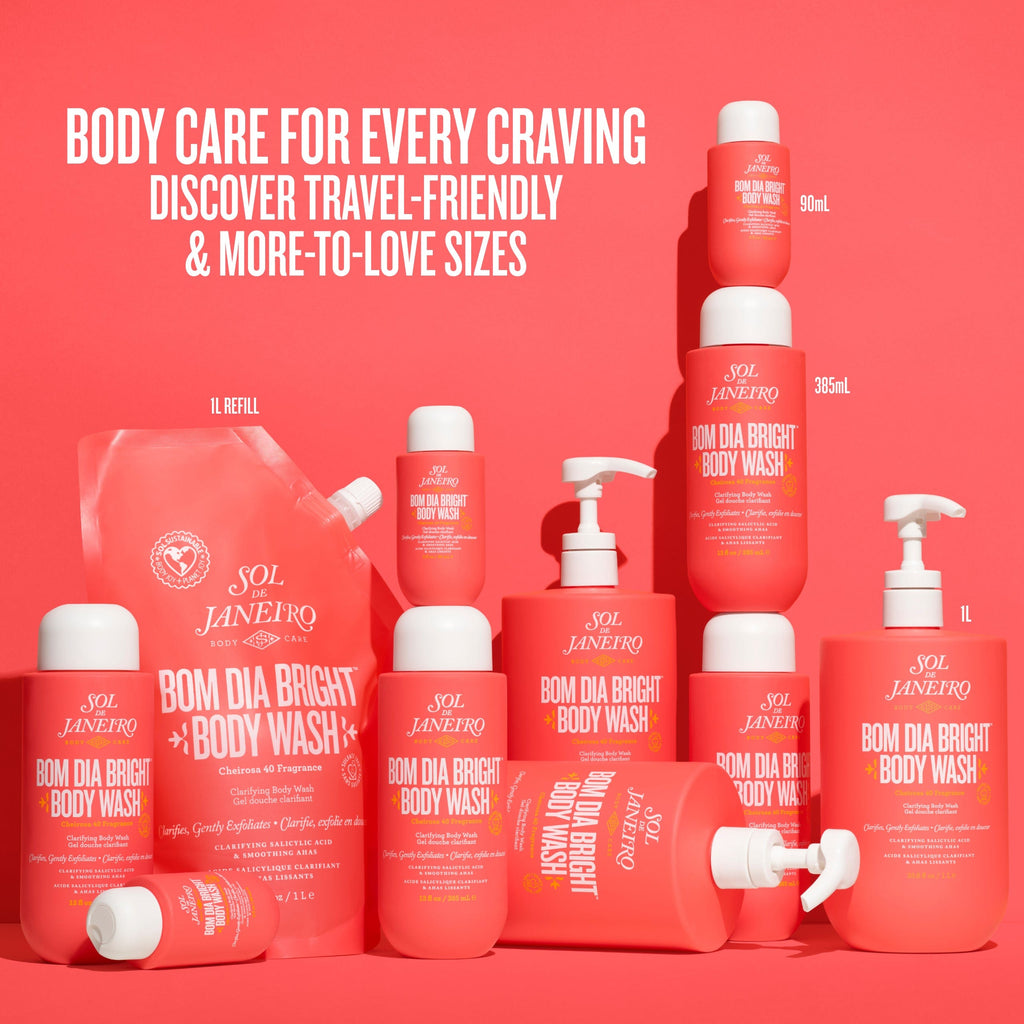 Collection of Sol de Janeiro Bom Dia Bright Body Wash bottles and packaging on a red background